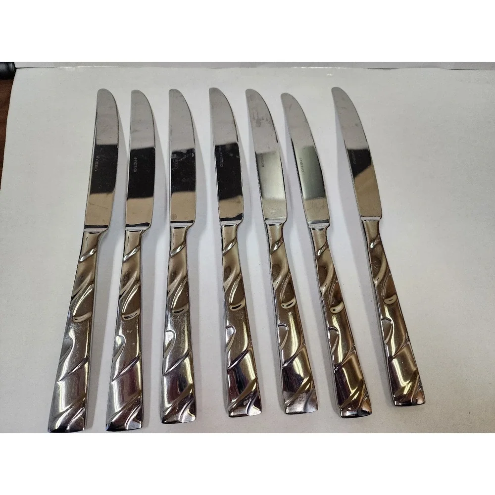 Oneida Allude Pattern Stainless Glossy‎ Swirls Set of 7 Dinner Knives GUC